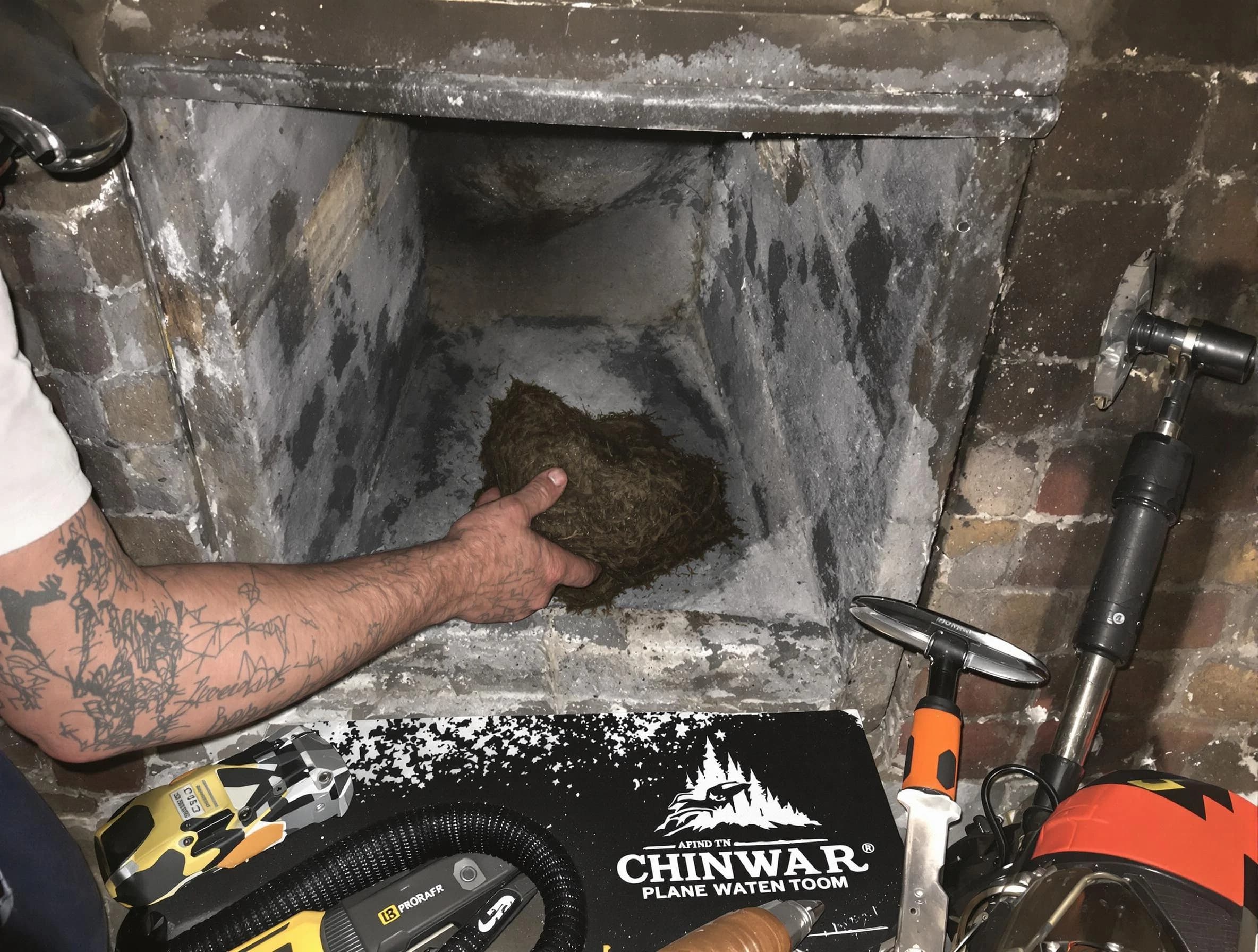 Smyrna Chimney Sweep safely removing debris and screening chimney in Smyrna, GA